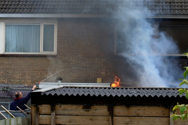Brand geblust in tuin in Broeksterwâld